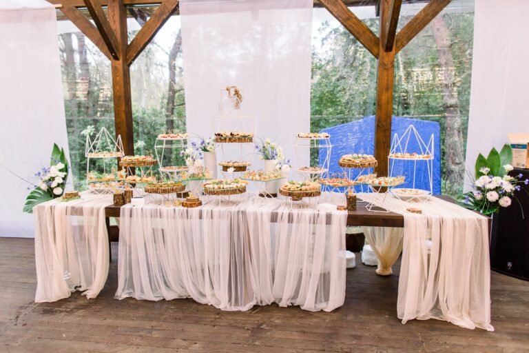 Catering service. Restaurant table with delicious food snacks at event. Wedding or event outdoors